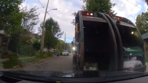 Risky maneuver by City of London garbage truck driver raises serious safety concerns