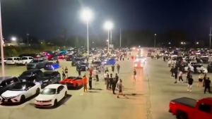 ‘Burnouts and fireworks on the roof of a building’; Hundreds gather for illegal car meet in south London