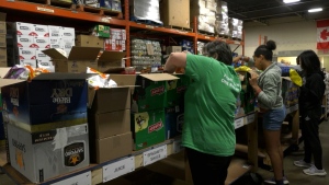 ‘It gives special meaning to Thanksgiving’: Holiday food drive on record pace after recent donations