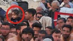 Finding the young girl captured in a photograph of Gaza detainees