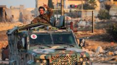 Who are the rebels seizing control of Syria’s second city?