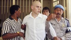 Australia says ‘Bali Nine’ drug smugglers have returned home