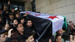 ‘I wish he’d lived to see new Syria’ – Crowds bury anti-Assad activist