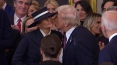 Awkward air kiss as Trump enters Capitol to applause