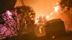 Watch: Moment man’s saved from burning LA home