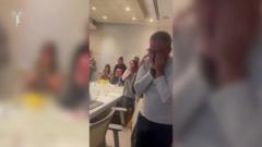 Watch: Father of freed Romi Gonen in tears as he watches release