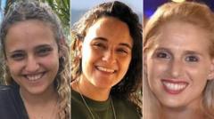 Who are the three Israeli hostages released by Hamas?