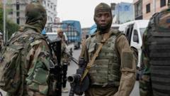 Gunfire and looting in DR Congo city as rebels advance