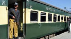 Pakistan militants attack train and take passengers hostage