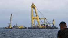 Diver dies working on tycoon’s sunken superyacht