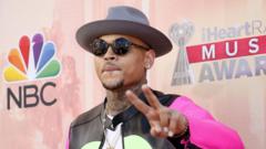 Chris Brown remanded in custody over alleged club attack