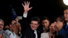 Huge challenges await new president of divided Romania