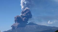 Mount Etna erupts as large plumes rise from volcano