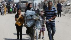 IDF says roads to Gaza aid centres are ‘combat zones’ as sites close for day