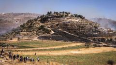 Two Palestinians killed in West Bank settler attack, health ministry says