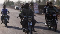 Almost 600 killed in south Syria violence, monitoring group says