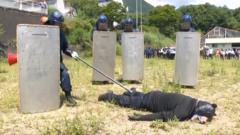 Watch: Man dons bear costume in Japanese Police animal attack drill