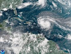 Erin rapidly intensifies to category five hurricane