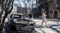 Wildfires rage across southern Europe as temperatures top 40C