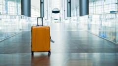 New Zealand woman arrested after two-year-old found in luggage