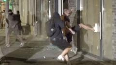 Protesters target Serbian ruling party offices in fifth night of demonstrations