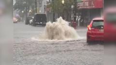 Flooded streets and subway systems as storms slam US East Coast