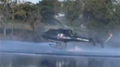 French helicopter crew survive crash into lake
