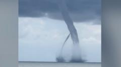 Watch: Twin waterspouts merge near Italian coastline
