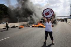 Israeli hostage families and demonstrators hold day of protests