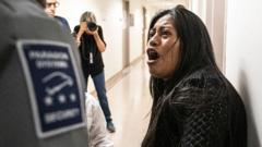 ICE officer disciplined after shoving woman to ground in courthouse