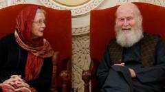 Son of British couple held by Taliban ‘ecstatic’ as they return to UK