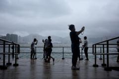 Howling winds and sheets of rain: In the eye of a typhoon in China