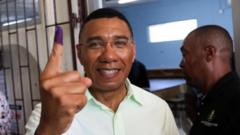 Jamaican PM Andrew Holness wins rare third term in office