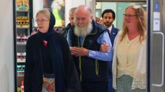 British couple held by Taliban arrive in UK after release