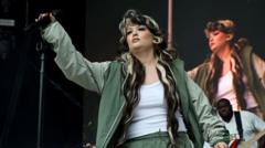 Lola Young ‘doing OK’ after collapsing on stage during gig