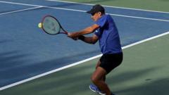 CEO who snatched boy’s hat at US Open says he made ‘huge mistake’