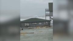 Watch: Moment houses topple into the sea in North Carolina