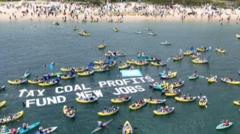 Climate protesters in kayaks disrupt operations at Australia port
