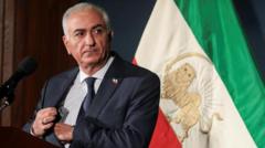 Exiled crown prince urges world to help protesters topple Iran’s government