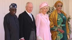 King Charles greets Nigerian president in Windsor sunshine
