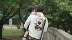 In Japan, divorce splits parents from children. Could a law change end sole custody?