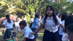 Schoolchildren run from collapsing roof as ground shakes in Philippines quake