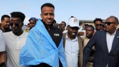Banned referee Artan arrives home in Somalia