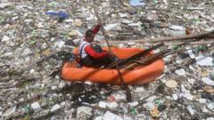 Watch: Tide of rubbish blankets Philippines river