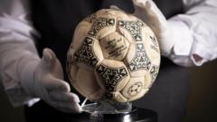 Maradona’s ‘Hand of God’ ball sells for £2.5m