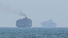 Hormuz talks positive, Oman says, as Iran warns deal would not open strait