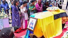 Body of world’s youngest traditional king returns home to Uganda amid succession row